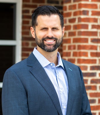 Portrait of JoJo Bucher, Commercial Realtor.